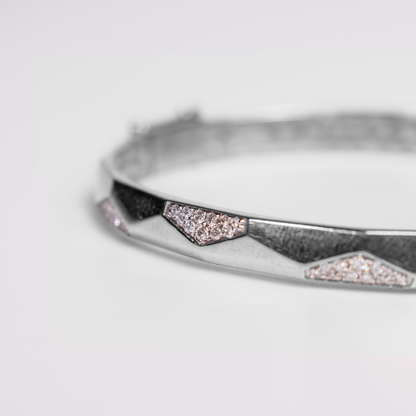 Felmeny Crested Home Bangle in White Gold with Diamonds