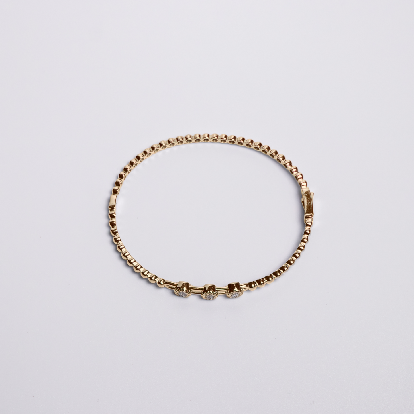 Felmeny Movable Stones Bangle in Gold with Diamonds