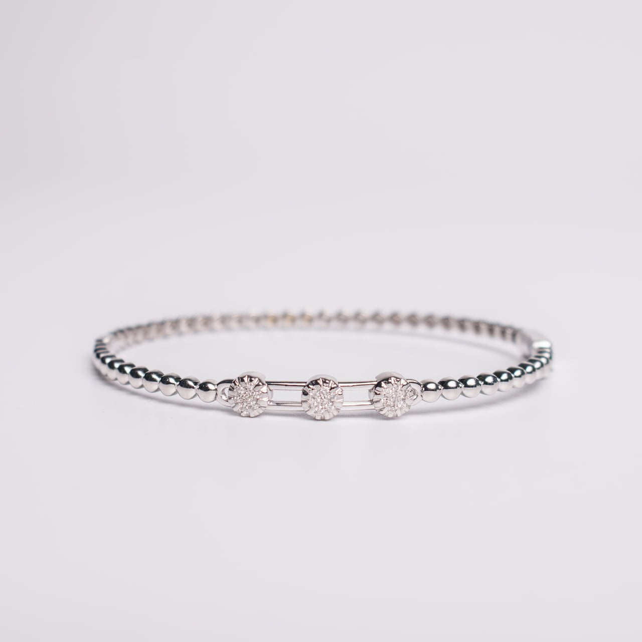 Felmeny Movable Stones Bangle in White Gold with Diamonds